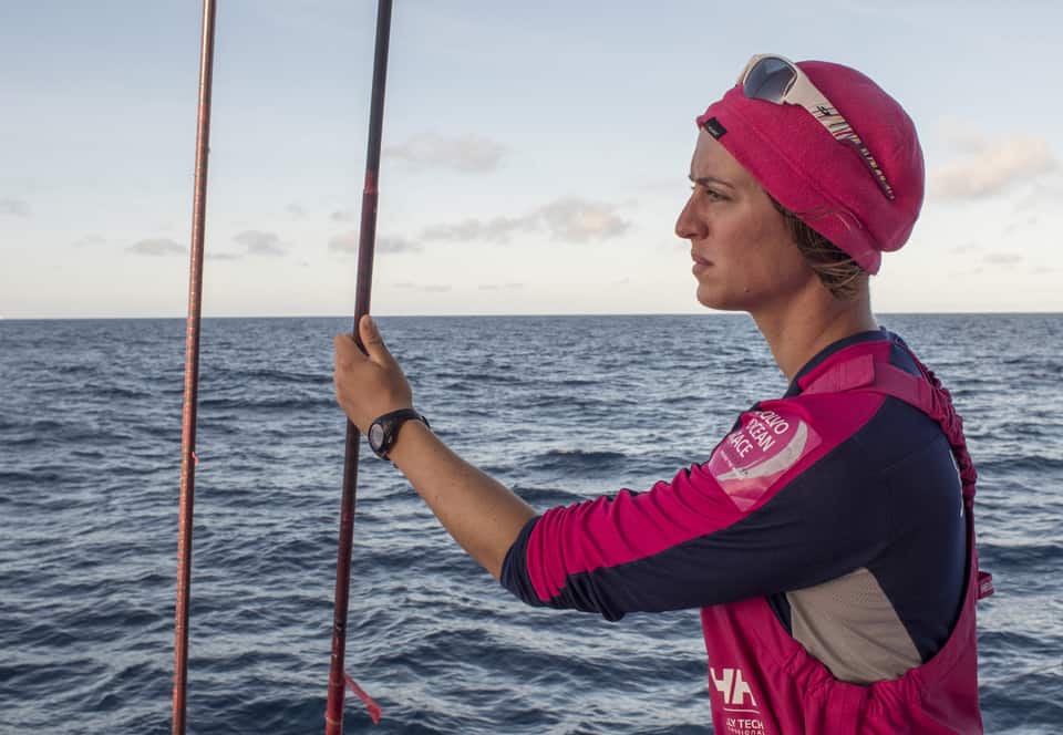 October 15, 2014. Leg 1 onboard Team SCA: Justine Mettraux watches the other boats for any tactical manoeuvre